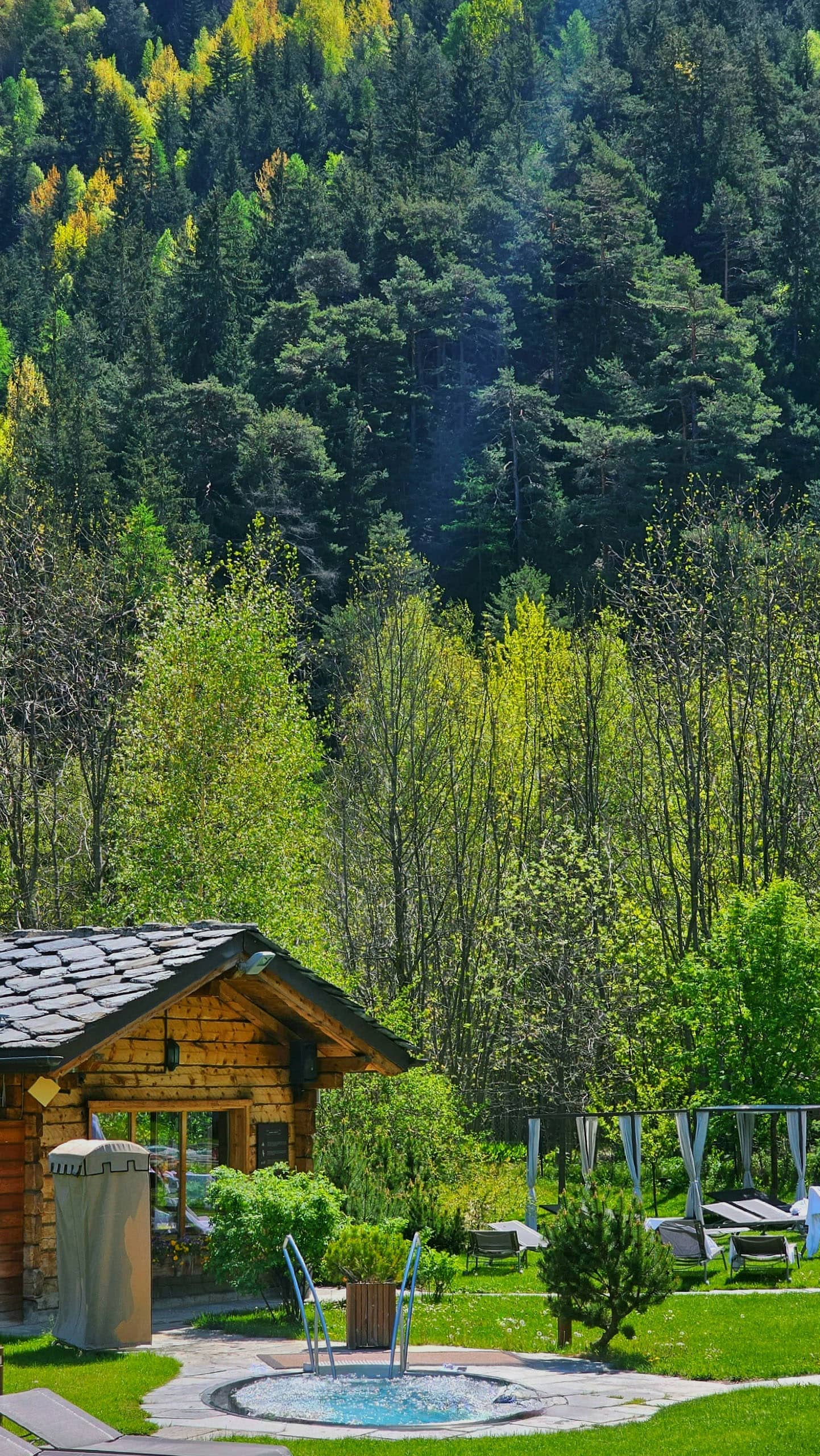 Cabin surrounded by green landscape